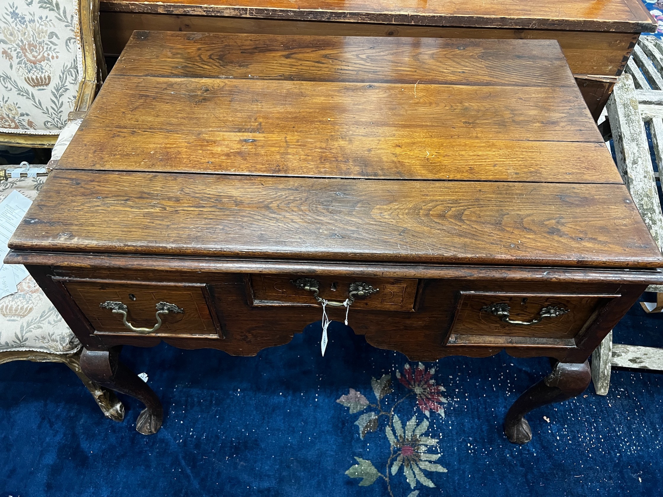 A George III and later oak kneehole table, converted from a stand, width 100cm depth 65cm height 74cm